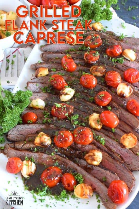 The key to a great tasting flank steak is the marinade. In this recipe, the steak is marinated in olive oil and balsamic vinegar, with mustard, honey, and garlic too. Grilled to your liking and served with blistered tomatoes and melted bocconcini, Grilled Flank Steak Caprese is a quick and easy, family-friendly meal! #flanksteak #beef #steak #grilling #caprese