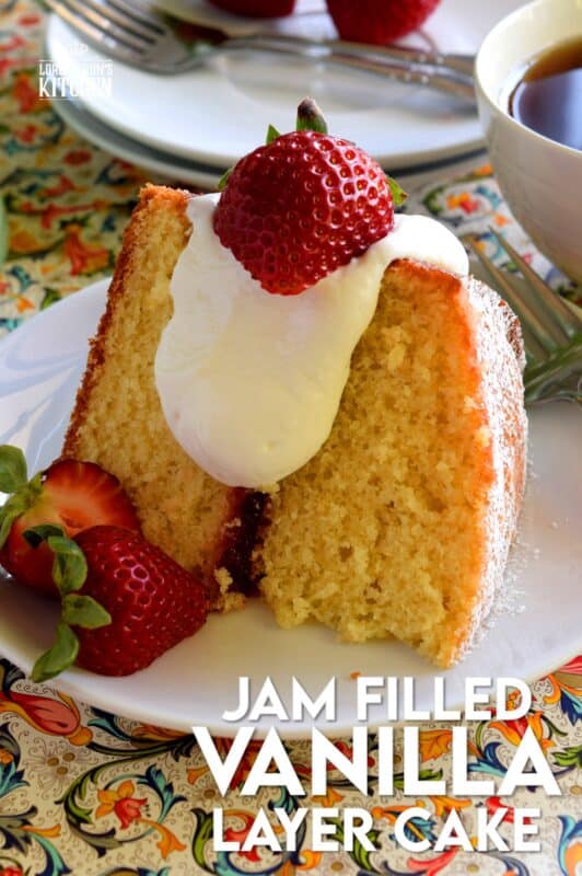 This gorgeous, easy-to-prepare, homemade Jam Filled Vanilla Layer Cake is not only delicious but also quite impressive! Although basic and rustic in presentation, this cake looks like a million bucks! No cake-decorating skills are needed for this beautiful showpiece! And, as a bonus, you can use your favourite jam flavour too! #jam #filling #cake #vanilla #easy #center