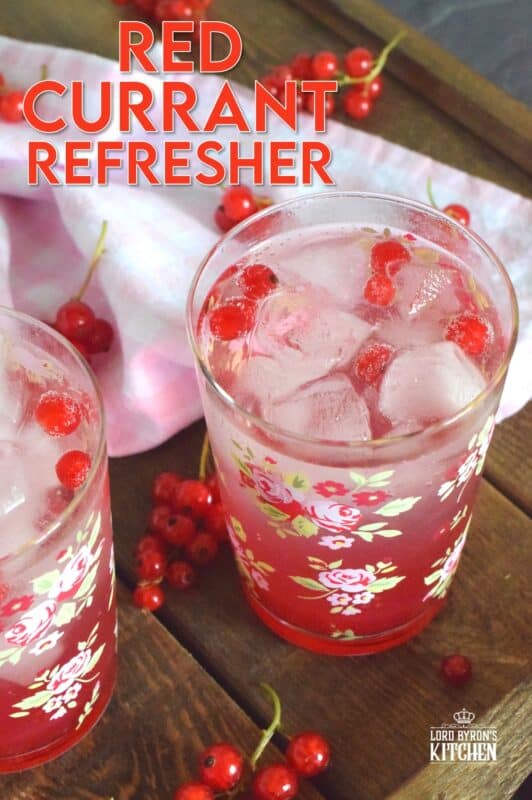 Cold, sweet, sparkling, and fizzy; this Red Currant Refresher starts with a red currant infused simple syrup and is stirred into lemon lime pop with lots of ice. Eat your heart out, Starbucks! Summer never tasted so good! #red #currant #redcurrants #currants #summer #drink #refresher