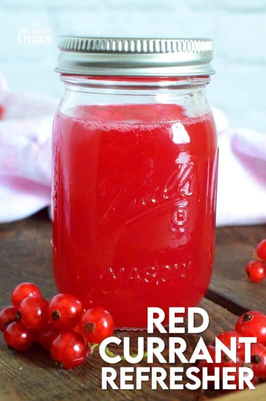 Cold, sweet, sparkling, and fizzy; this Red Currant Refresher starts with a red currant infused simple syrup and is stirred into lemon lime pop with lots of ice. Eat your heart out, Starbucks! Summer never tasted so good! #red #currant #redcurrants #currants #summer #drink #refresher