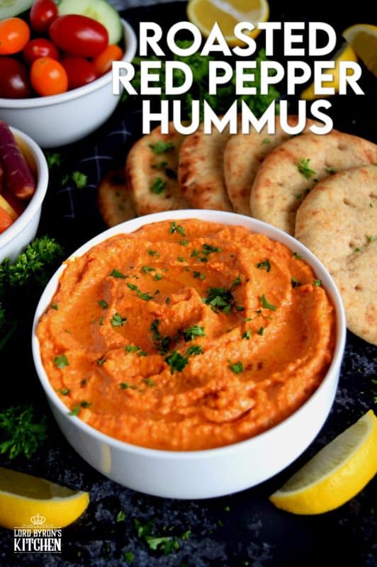 Probably the most common and recognizable hummus, Roasted Red Pepper Hummus packs a punch of deep smoky flavour with a burst of lemon freshness and the warmth of fresh garlic!  A great flavour to start with if the world of homemade hummus is new to you! #hummus #homemade #dip #spreads #redpepper #roasted #roastedredpeppers