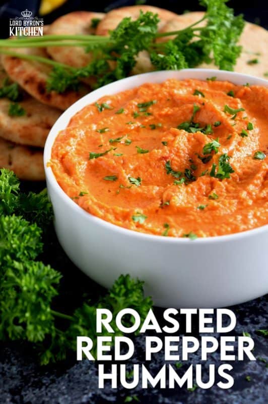 Probably the most common and recognizable hummus, Roasted Red Pepper Hummus packs a punch of deep smoky flavour with a burst of lemon freshness and the warmth of fresh garlic!  A great flavour to start with if the world of homemade hummus is new to you! #hummus #homemade #dip #spreads #redpepper #roasted #roastedredpeppers