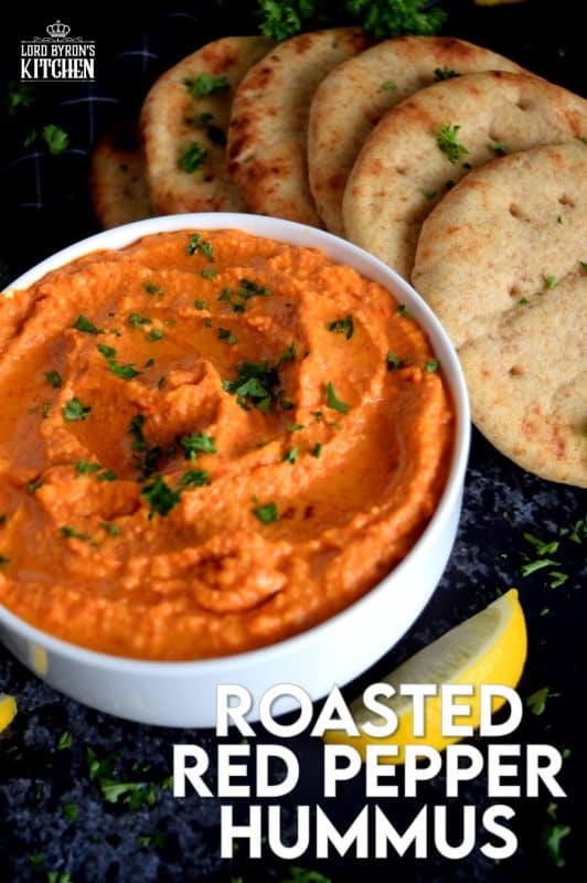 Probably the most common and recognizable hummus, Roasted Red Pepper Hummus packs a punch of deep smoky flavour with a burst of lemon freshness and the warmth of fresh garlic!  A great flavour to start with if the world of homemade hummus is new to you! #hummus #homemade #dip #spreads #redpepper #roasted #roastedredpeppers