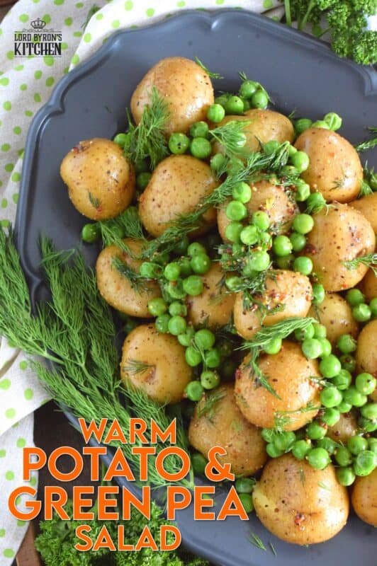 This warm salad consists of pillow-soft baby potatoes, bright green peas, and lots of fresh dill. These are tossed in a dressing prepared with olive oil, grainy mustard, champagne vinegar, and seasonings. Serve this dish anytime, because a really good potato salad is always a hit! #potatosalad #dill #babypotatoes #greenpeas #warmsalad