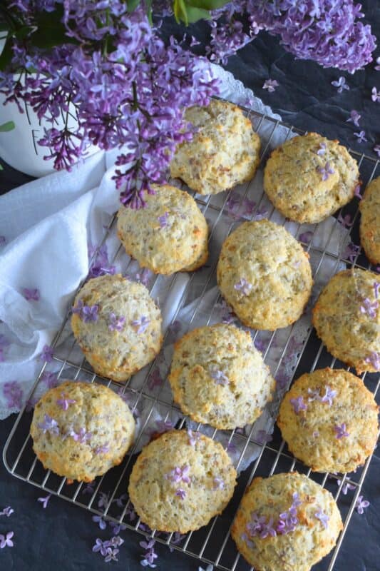 Light and fluffy Lilac Breakfast Biscuits are not your average biscuit. They are only slightly sweet, but they are very aromatic and pretty too! Some refer to these as tea biscuits, but they're quite large and too special to be just a biscuit. Prepare these for a weekend family breakfast or make them a part of a guest brunch - they really are quite impressive! #lilacs #breakfast #brunch #teabiscuits #biscuits
