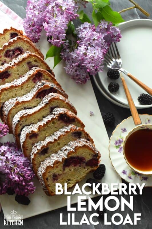 A super moist loaf prepared with fresh blackberries, lemon juice and zest, and hand-picked lilac petals. Not only is this Blackberry Lemon Lilac Loaf delicious and pretty, it is also quite fragrant! If you are fond of the smell of lilacs in early summer, this dessert is sure to please! #edibleflowers #lilacs #loaf #lemon #blackberry #lemonloaf #lilac