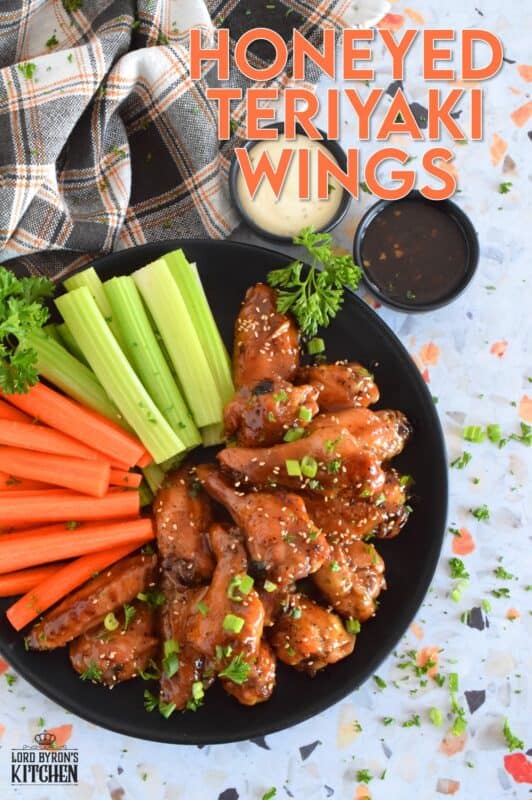 These chicken wings are first baked to golden perfection before being tossed in the most delicious sticky, sweet sauce. The sauce is made from scratch in just a few minutes, and with its sweet, tangy, savoury, and salty flavour, these Honeyed Teriyaki Wings are the absolute best! #wings #chickenwings #teriyaki #honey #honeyed #bakednotfried