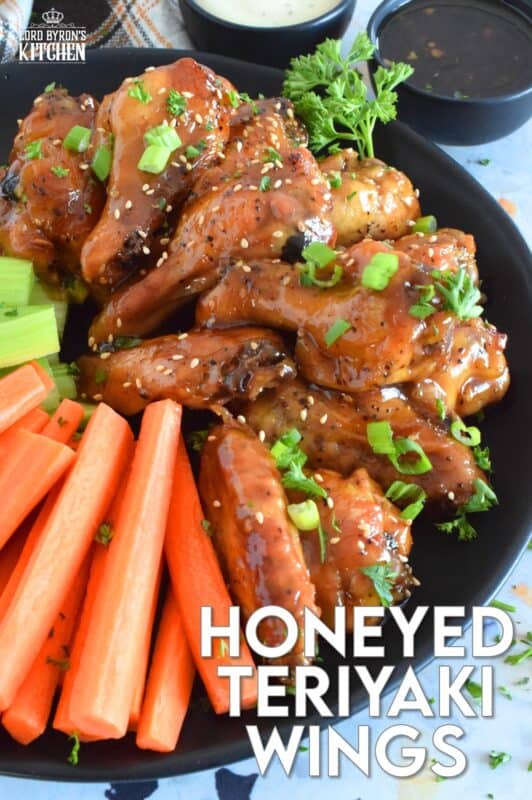 These chicken wings are first baked to golden perfection before being tossed in the most delicious sticky, sweet sauce. The sauce is made from scratch in just a few minutes, and with its sweet, tangy, savoury, and salty flavour, these Honeyed Teriyaki Wings are the absolute best! #wings #chickenwings #teriyaki #honey #honeyed #bakednotfried