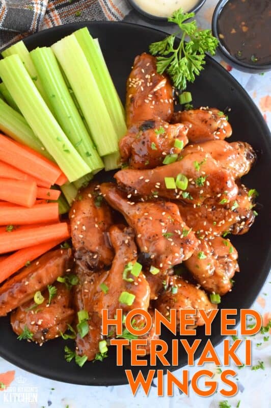 These chicken wings are first baked to golden perfection before being tossed in the most delicious sticky, sweet sauce. The sauce is made from scratch in just a few minutes, and with its sweet, tangy, savoury, and salty flavour, these Honeyed Teriyaki Wings are the absolute best! #wings #chickenwings #teriyaki #honey #honeyed #bakednotfried