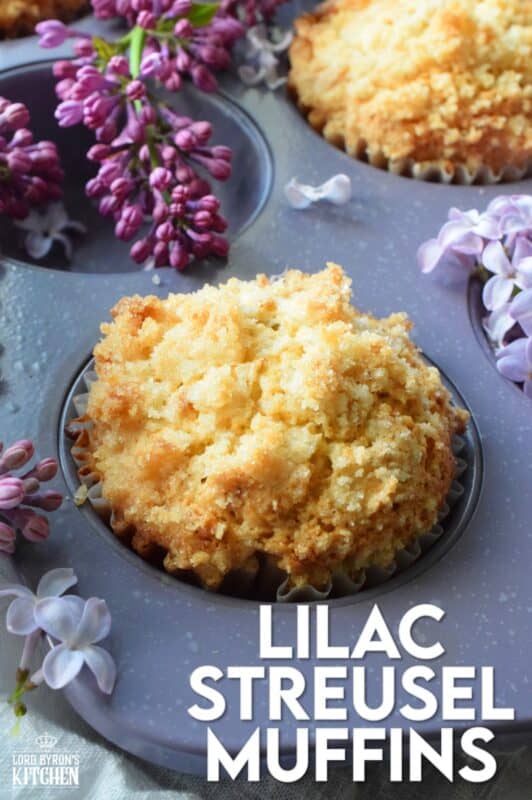 Mildly sweet Lilac Streusel Muffins are made with real lilac flowers, sweetened with homemade lilac sugar, and tinted with a floral, fragrant homemade lilac syrup. If that wasn't enough, the streusel crumb topping is super easy to make and adds a nice flaky crunch to the top of the deliciously soft and moist muffin! #lilac #streusel #muffins #lilacs #edibleflowers #crumbtopping