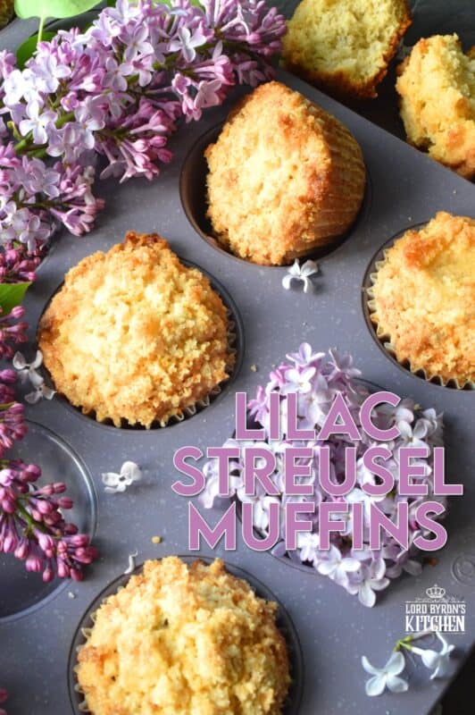 Mildly sweet Lilac Streusel Muffins are made with real lilac flowers, sweetened with homemade lilac sugar, and tinted with a floral, fragrant homemade lilac syrup. If that wasn't enough, the streusel crumb topping is super easy to make and adds a nice flaky crunch to the top of the deliciously soft and moist muffin! #lilac #streusel #muffins #lilacs #edibleflowers #crumbtopping