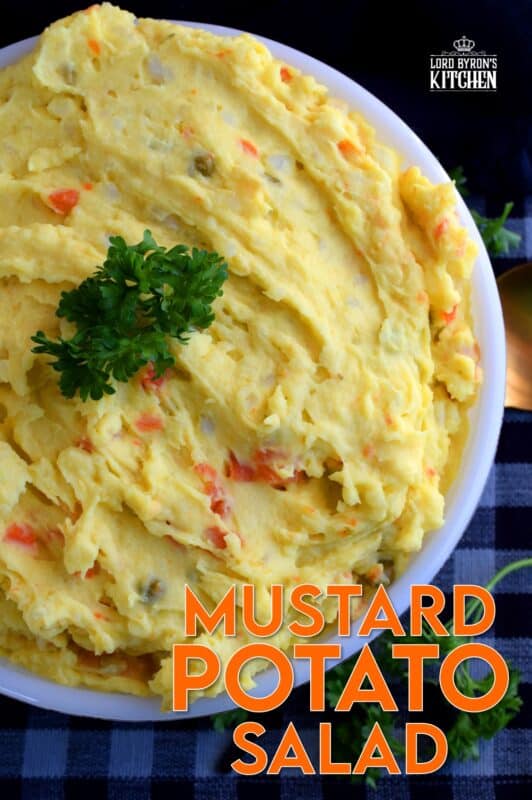 Mustard Potato Salad is very similar to regular potato salad, but with tang and zing from yellow mustard. Adding a vegetable medley consisting of peas, beans, corn, and carrots gives the salad more texture and flavour. Update your regular salad with a new flavour profile! #potato #salad #mustard #newfie #newfoundland #recipes