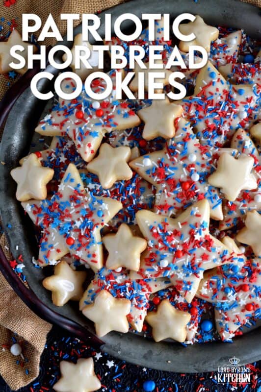 A classic, old-fashioned shortbread recipe is the basis of this festively decorated and garnished, beautiful Patriotic Glazed Shortbread Cookies. These are gorgeous and look super appealing. They make a great gift idea too! The light, buttery, crisp cookie stands up well to the shiny, sugary icing! #patriotic #4thofjuly #independenceday #baking #redwhiteandblue #redwhite&blue #cookies #sprinkles #shortbread