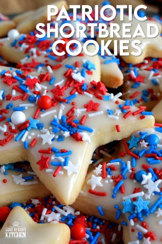 A classic, old-fashioned shortbread recipe is the basis of this festively decorated and garnished, beautiful Patriotic Glazed Shortbread Cookies. These are gorgeous and look super appealing. They make a great gift idea too! The light, buttery, crisp cookie stands up well to the shiny, sugary icing! #patriotic #4thofjuly #independenceday #baking #redwhiteandblue #redwhite&blue #cookies #sprinkles #shortbread