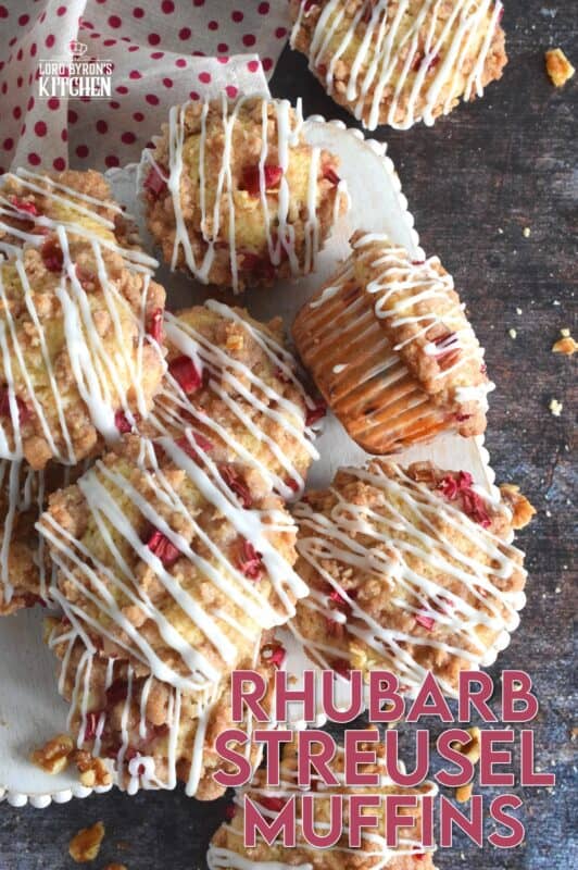 A blissfully tart muffin with just the right amount of sweet; Rhubarb Streusel Muffins consists of fresh rhubarb and crunchy walnuts. And, if that wasn’t enough, the streusel crumb topping is super easy to make and adds a nice flaky crunch to the top of the deliciously soft and moist muffin! Delicious! #rhubarb #streusel #muffins #brunch #summer #rhubarbrecipes