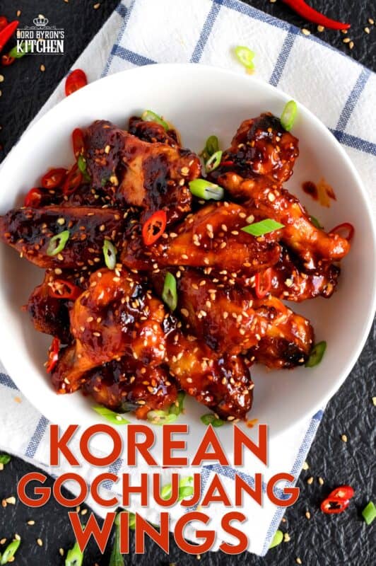 Perfectly baked chicken wings which have been tossed in a spicy sauce! Korean Gochujang Chicken Wings are completely addictive! These hit all of your taste buds with a little bit of spice, heat, sweet, and salt! #korean #gochujang #chicken #wings #spicy