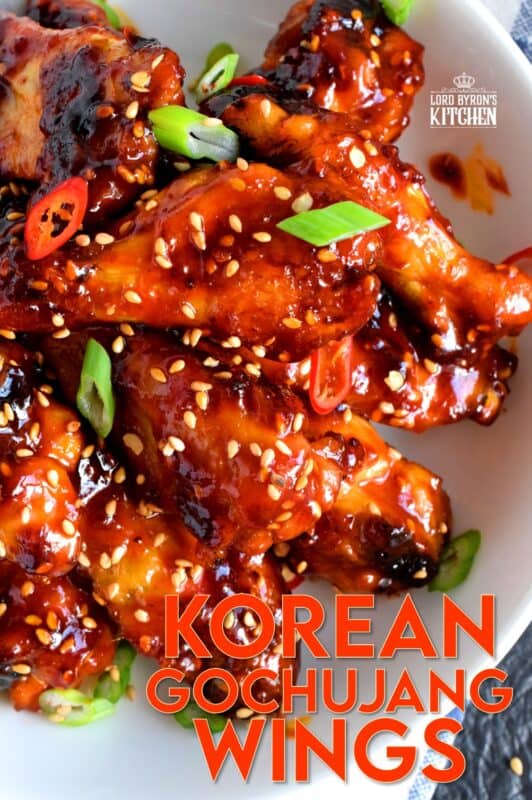 Perfectly baked chicken wings which have been tossed in a spicy sauce! Korean Gochujang Chicken Wings are completely addictive! These hit all of your taste buds with a little bit of spice, heat, sweet, and salt! #korean #gochujang #chicken #wings #spicy