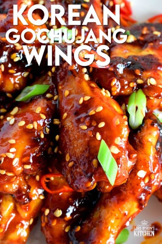 Perfectly baked chicken wings which have been tossed in a spicy sauce! Korean Gochujang Chicken Wings are completely addictive! These hit all of your taste buds with a little bit of spice, heat, sweet, and salt! #korean #gochujang #chicken #wings #spicy