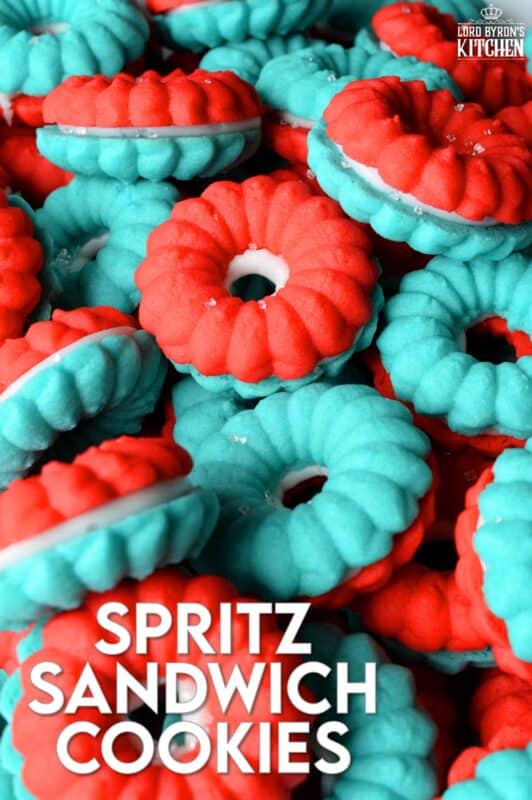 Everyone loves a spritz cookie, especially at Christmas! But, why should they only make an appearance once a year? In this version, I've coloured the cookie dough red and blue and sandwiched them with white frosting. These are most certainly bright and festive - perfect for your 4th of July celebrations! #spritz #cookies #sandwichcookies #redwhiteblue #4thofjuly #redwhiteandblue