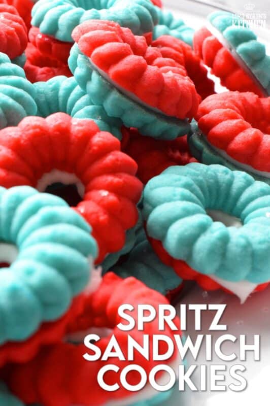 Everyone loves a spritz cookie, especially at Christmas! But, why should they only make an appearance once a year? In this version, I've coloured the cookie dough red and blue and sandwiched them with white frosting. These are most certainly bright and festive - perfect for your 4th of July celebrations! #spritz #cookies #sandwichcookies #redwhiteblue #4thofjuly #redwhiteandblue