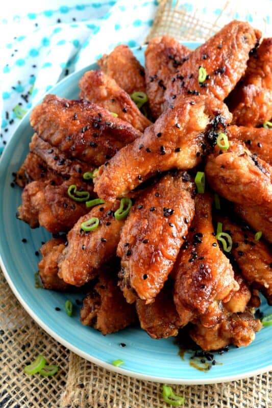Japanese Chicken Wings are baked with a light and crispy coating in an Asian-inspired sauce prepared with soy sauce, vinegar, and sugar. They are super moist and tender on the inside with a golden crispy skin on the outside. It's hard to share these wings, because they're just so delicious! #wings #asianinspired #japan #japanese #chicken #chickenwings