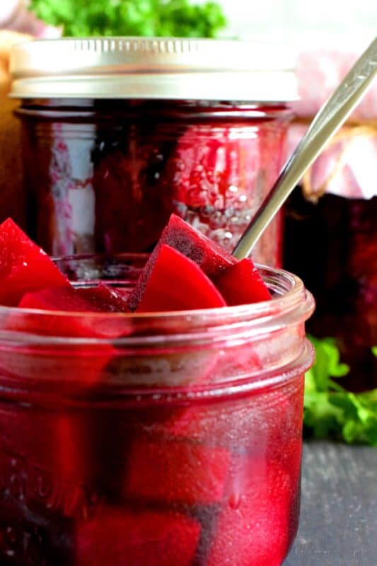 Preserving a fall harvest is an experience like no other, and every home chef should try canning at least once. Dad's Canned Pickled Beets is the perfect place to start, because their very easy to can. No fancy equipment needed for this one! They're sweet, vinegary, and fork-tender; these beets will keep you smiling all winter long! #canning #pickled #pickling #beets #pickledbeets