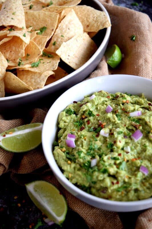 This guacamole recipe is for the picky eater; we all have at least one in our lives! Guacamole for Cilantro Haters has three things that make it different than any other guacamole recipe. Even though this version has dried cilantro instead of fresh, cilantro haters, this one is for you! #guacamole #cilantro #without #nocilantro #dip