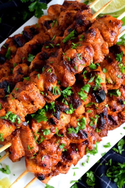 With just a little bit of prep, and by using mostly pantry ingredients, Mexican Dry Rub Grilled Chicken Skewers are seasoned perfectly and are quite delicious! Use boneless, skinless chicken thighs to make this main super quick and easy. Also, control the spice level and don't skip the spritz of fresh lime juice! #mexican #grilled #skewers #chicken #kebabs #summer #bbq