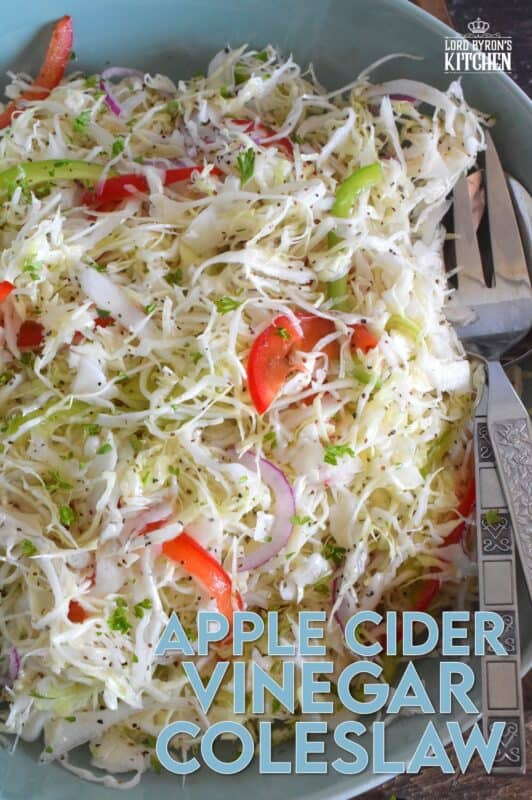 Apple Cider Vinegar Coleslaw is packed with robust flavours!  Like most coleslaw recipes, this one starts with shredded cabbage, but it is combined with red and green bell peppers, and thinly sliced red onions too.  Tossed in a sweet oil and vinegar dressing, it’s hard to say no to a second helping! #coleslaw #vinegary #applecider #salad #summersides