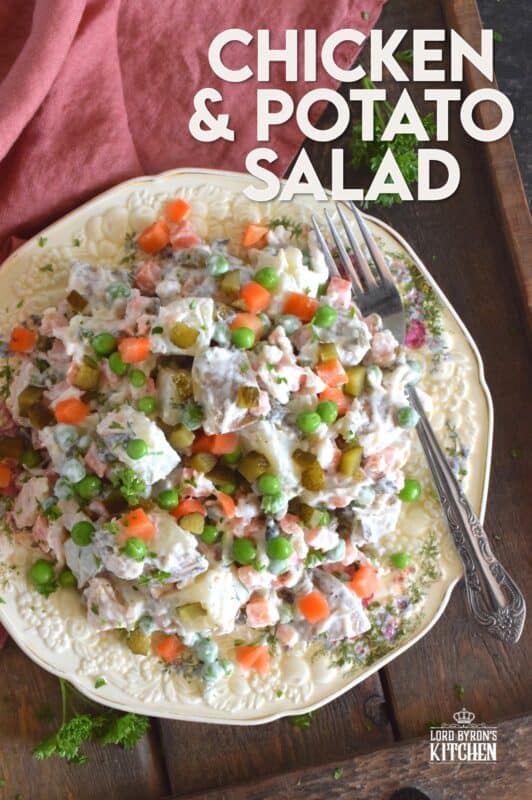 The combination of chicken and some version of a potato recipe has always been a classic meal, so why not combine the two? Chicken and Potato Salad is a mayonnaise-based, creamy salad prepared with peas, carrots, chives, and pickles too! This salad is a meal in itself, but also, perfectly and easily paired with any backyard BBQ mains! #potatosalad #chicken #salad #summermeals #sides #summersides