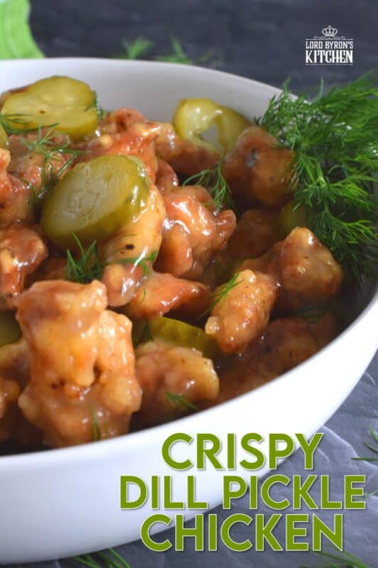 Sounds odd, right!? But, if you love dill pickles and you love fried chicken, you'll love this recipe! Boneless, skinless chicken thighs are marinated in jarred dill pickle juice and then fried with a light and crispy coating. Tossed in a sweet, dill pickle sauce with sliced pickles, Fried Dill Pickle Chicken is about as pickley as anything can get! #dill #dillpickle #chicken #friedchicken #picklebrine
