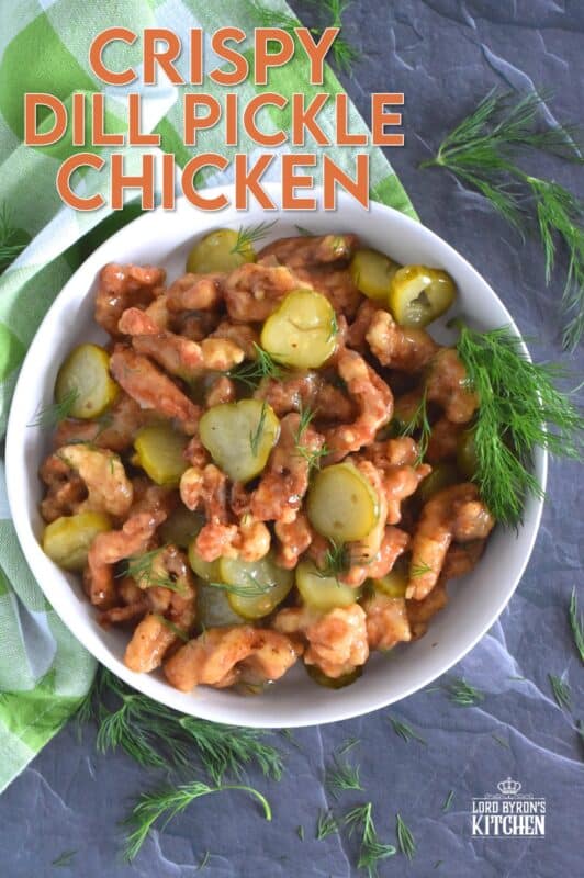 Sounds odd, right!? But, if you love dill pickles and you love fried chicken, you'll love this recipe! Boneless, skinless chicken thighs are marinated in jarred dill pickle juice and then fried with a light and crispy coating. Tossed in a sweet, dill pickle sauce with sliced pickles, Fried Dill Pickle Chicken is about as pickley as anything can get! #dill #dillpickle #chicken #friedchicken #picklebrine