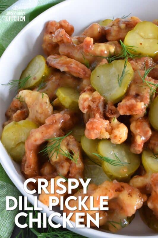 Sounds odd, right!? But, if you love dill pickles and you love fried chicken, you'll love this recipe! Boneless, skinless chicken thighs are marinated in jarred dill pickle juice and then fried with a light and crispy coating. Tossed in a sweet, dill pickle sauce with sliced pickles, Fried Dill Pickle Chicken is about as pickley as anything can get! #dill #dillpickle #chicken #friedchicken #picklebrine