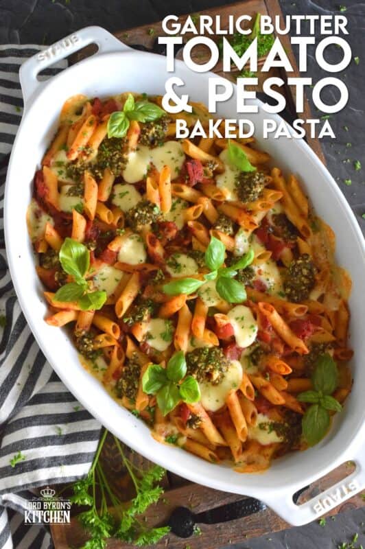 That title is a mouthful and that's exactly what you will have once you prepare this Garlic Butter Tomato and Pesto Baked Pasta in your home! Perfectly cooked pasta is flavoured with both seasoned tomatoes and basil pesto and baked with garlic butter and bocconcini until melted and gooey. This just might be my new favourite way to make pasta! #bakedpasta #pasta #casserole #ziti #basil #pesto #cheesy #garlicbutter