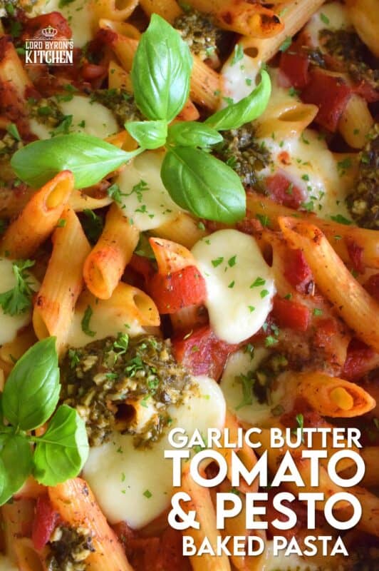 That title is a mouthful and that's exactly what you will have once you prepare this Garlic Butter Tomato and Pesto Baked Pasta in your home! Perfectly cooked pasta is flavoured with both seasoned tomatoes and basil pesto and baked with garlic butter and bocconcini until melted and gooey. This just might be my new favourite way to make pasta! #bakedpasta #pasta #casserole #ziti #basil #pesto #cheesy #garlicbutter