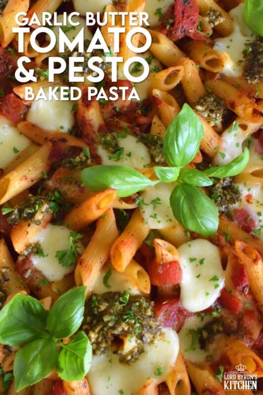 That title is a mouthful and that's exactly what you will have once you prepare this Garlic Butter Tomato and Pesto Baked Pasta in your home! Perfectly cooked pasta is flavoured with both seasoned tomatoes and basil pesto and baked with garlic butter and bocconcini until melted and gooey. This just might be my new favourite way to make pasta! #bakedpasta #pasta #casserole #ziti #basil #pesto #cheesy #garlicbutter