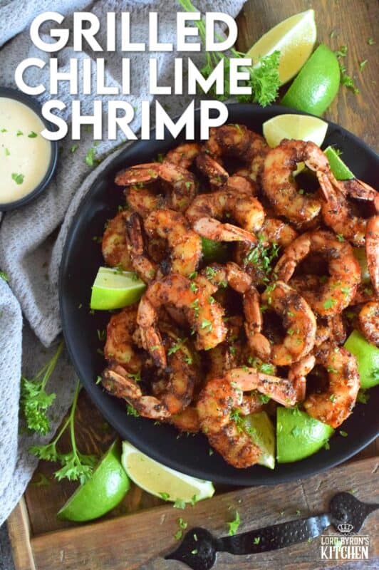 Marinated in a mixture of warming dried herbs and spices with a splash of olive oil and a spritz of fresh lime juice, these Grilled Chili Lime Shrimp are bursting with flavour! Quickly grilled over high heat to get a good sear and colour without the risk of overcooking makes it hard to stop from eating them all! #grilled #shrimp #chililime #lime #jumboshrimp
