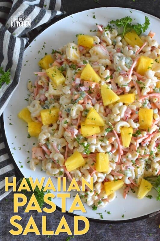 A traditional Hawaiian Pasta Salad does not include fresh pineapple, however, the combination of the two is just wonderful! Loaded with lots of fresh veggies, and prepared with a lightened up creamy sauce, this version is delightfully refreshing and delicious too! #pasta #pastasalad #hawaiian #summersalad #picnic #bbq