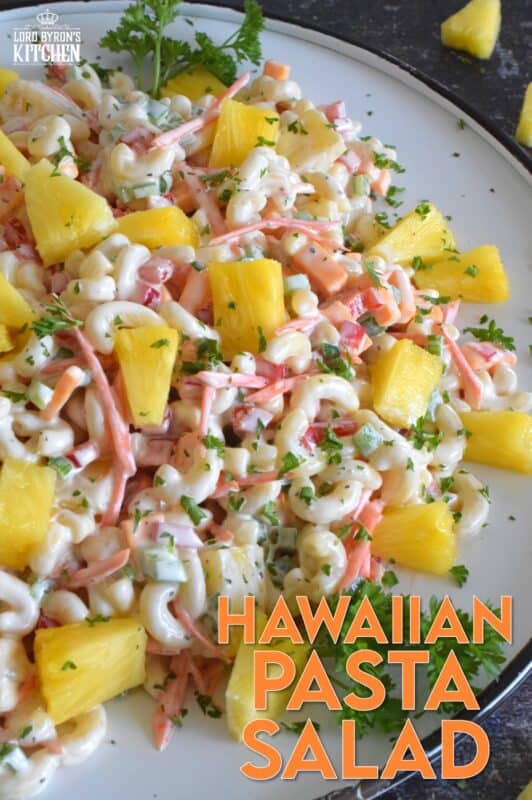 A traditional Hawaiian Pasta Salad does not include fresh pineapple, however, the combination of the two is just wonderful! Loaded with lots of fresh veggies, and prepared with a lightened up creamy sauce, this version is delightfully refreshing and delicious too! #pasta #pastasalad #hawaiian #summersalad #picnic #bbq