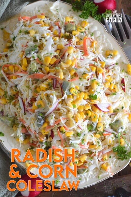 Peppery radish, crisp corn, creamy avocado, fresh green onions, sweet carrots, and crunchy cabbage all meet in the middle to create this most delicious Radish and Corn Coleslaw. With its creamy, zesty, and tart dressing, this coleslaw will most definitely please the toughest critic! #coleslaw #salad #sides #summer #summersides
