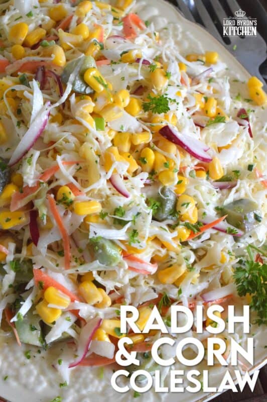 Peppery radish, crisp corn, creamy avocado, fresh green onions, sweet carrots, and crunchy cabbage all meet in the middle to create this most delicious Radish and Corn Coleslaw. With its creamy, zesty, and tart dressing, this coleslaw will most definitely please the toughest critic! #coleslaw #salad #sides #summer #summersides
