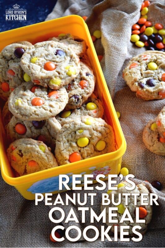 Reese's Pieces Peanut Butter Oatmeal Cookies are made with the peanut butter lover in mind.  Heavily loaded with peanut flavour by means of peanut butter, chopped peanuts, and a copious amount of Reese's Pieces, this cookie is sure to please the peanut butter kid in all of us! #peanutbutter #reeses #reesespieces #oatmealcookies #cookies