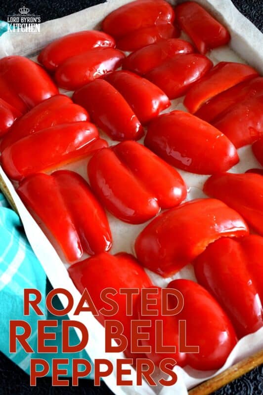 Roasted Red Peppers are a versatile condiment, ingredient, and topping. The ways to use Roasted Red Peppers and endless, and making your own is both easy and fun! If you don't grow your own, buy a bunch when there on sale and make your own roasted peppers at home! #redpeppers #roastedredpeppers #antipasto #canning #bellpeppers #preserving