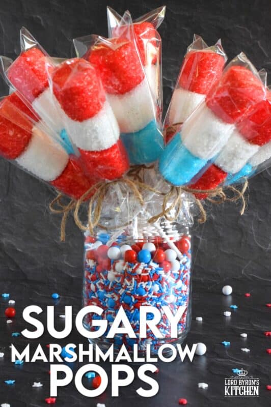 Young kids and old kids alike will love these Sugary Marshmallow Pops! They're easy to prepare and a lot of fun too. It's like making a craft that you can eat when your finished working on it. Crafting and eating - the best of both worlds combined! #marshmallows #marshmallowpops #sprinkles #4thofjuly #canadaday
