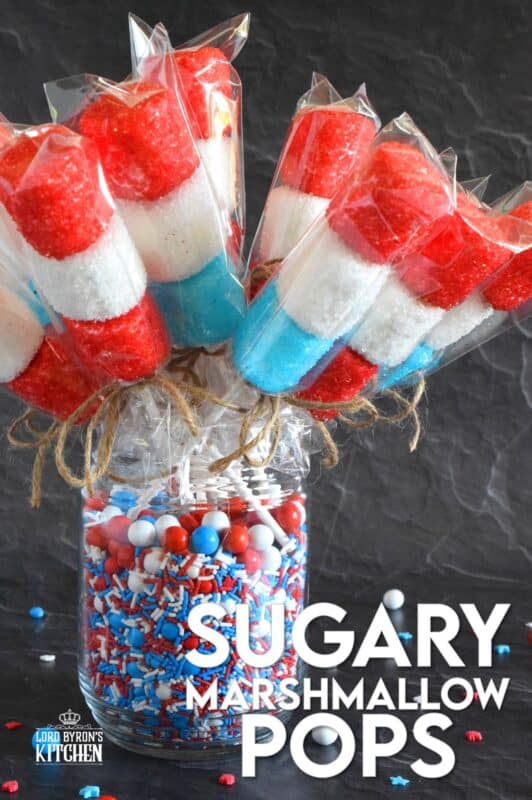Young kids and old kids alike will love these Sugary Marshmallow Pops! They're easy to prepare and a lot of fun too. It's like making a craft that you can eat when your finished working on it. Crafting and eating - the best of both worlds combined! #marshmallows #marshmallowpops #sprinkles #4thofjuly #canadaday