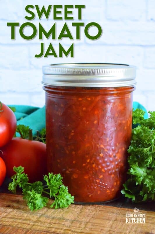 Sweet Tomato Jam is a thick, sticky jam prepared with summer fresh tomatoes, onions, and seasonings. Move over ketchup; there's a new condiment in town! #tomato #jam #sweet #homemade