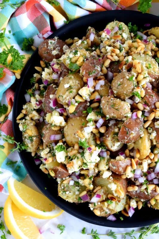 Inspired by classic Greek ingredients, with bright and fresh flavours, Greek Potato Salad is a great alternative to regular home style potato salad. Complete with feta, lemon, dill and pine nuts - who could resist!? #potato #salad #summer #picnic #potluck