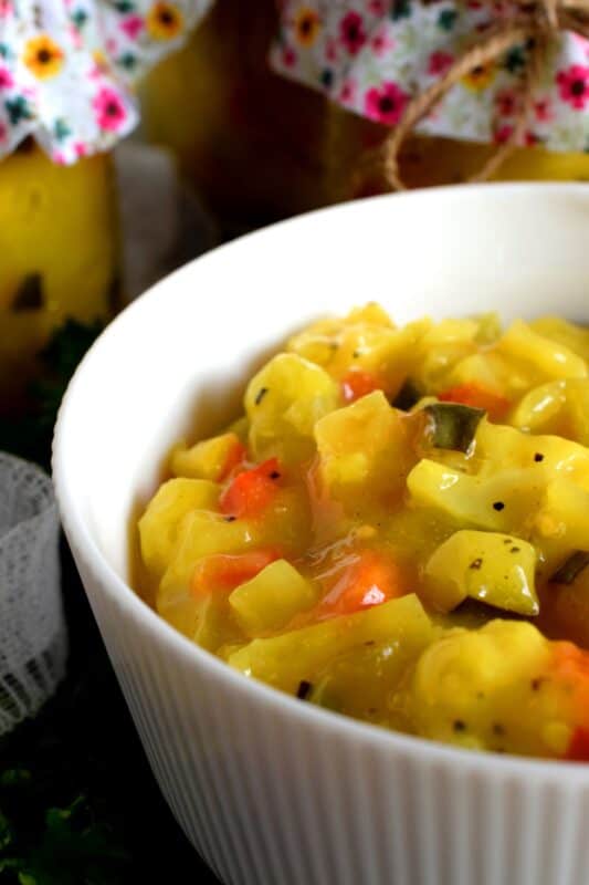 Preserved Mustard Pickles are a sweet and tart condiment or side dish made from cauliflower, zucchini, red bell pepper, onion, and carrot. A condiment so delicious, I often eat it as a side dish! #preserved #canning #mustard #pickles #newfoundland #newfie