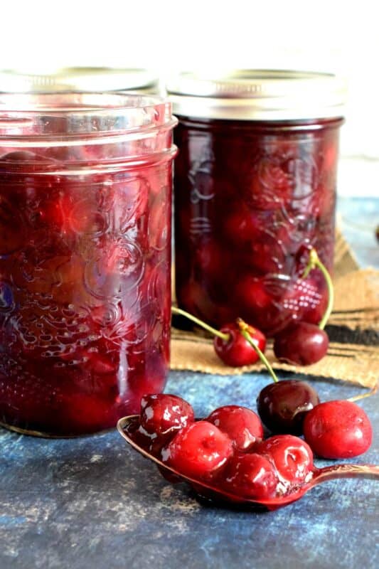 Quick and Easy Cherry Pie Filling is the best way to fill up a pie crust. Whole, pitted cherries, in a thick, not-too-sweet homemade sauce, is just the thing to make your summer cherry pie a little more special. #cherries #piefilling #cherrypie #cherry #pie #smallbatch