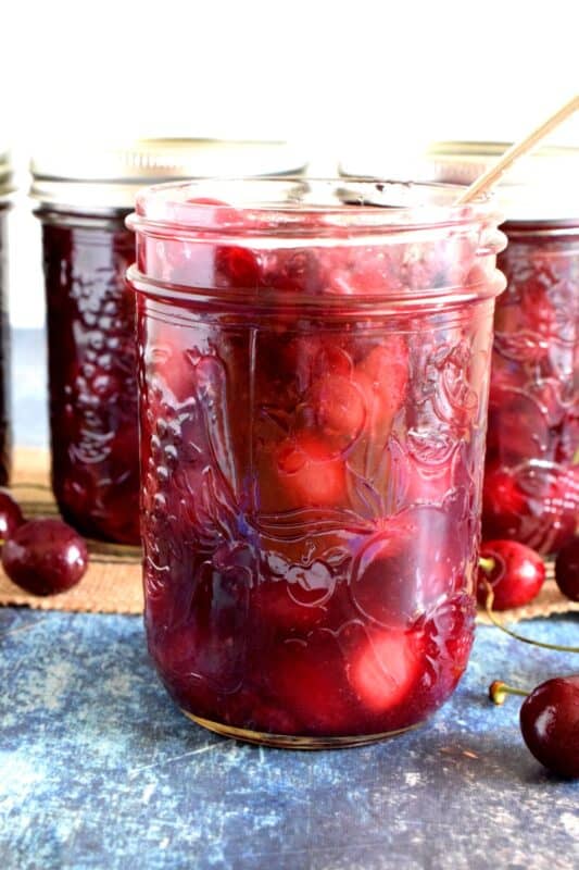 Quick and Easy Cherry Pie Filling is the best way to fill up a pie crust. Whole, pitted cherries, in a thick, not-too-sweet homemade sauce, is just the thing to make your summer cherry pie a little more special. #cherries #piefilling #cherrypie #cherry #pie #smallbatch
